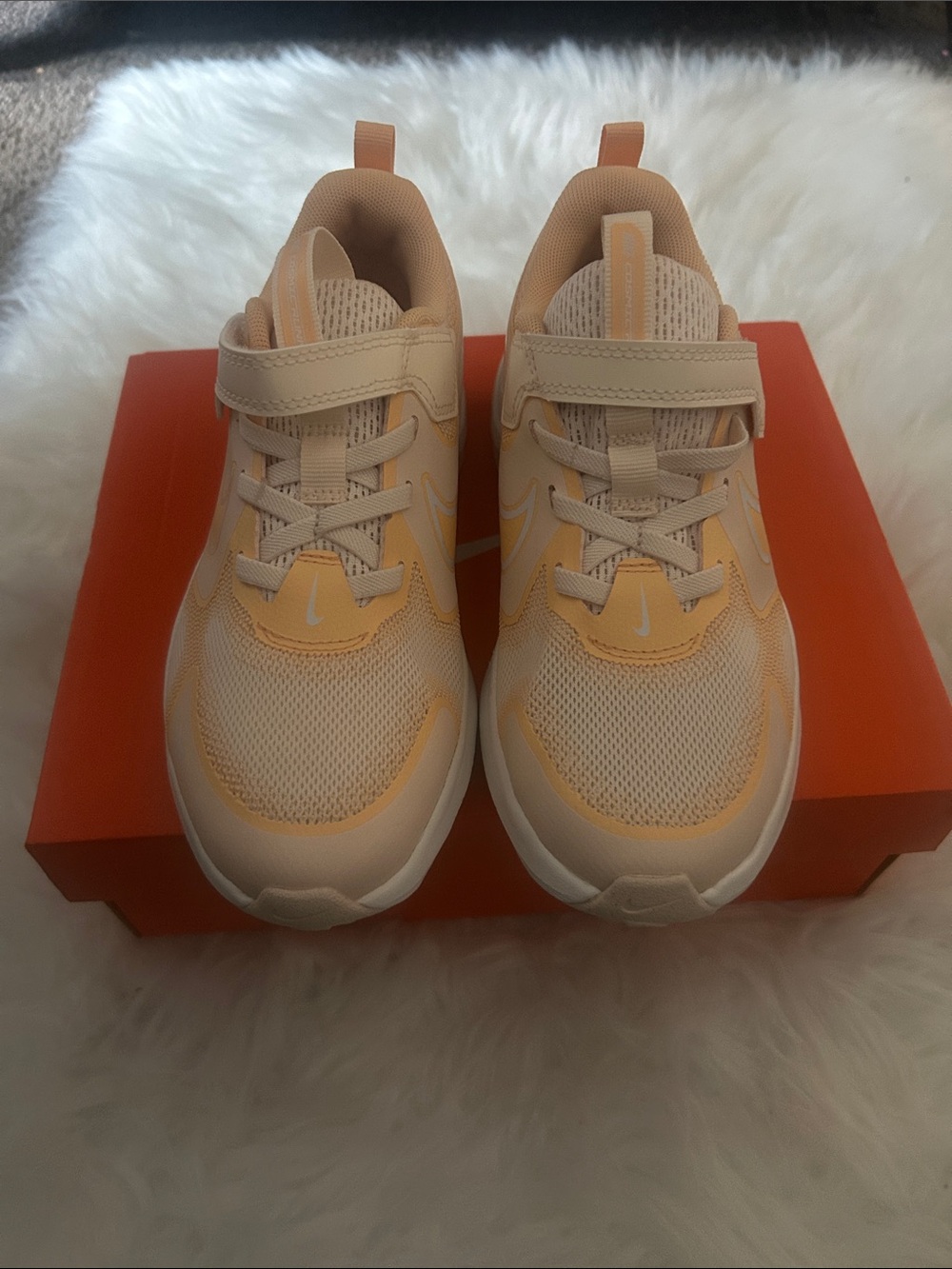 New in box peach colored Nikes size 3
